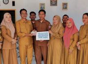 Lunasi PBB 100 Persen, Desa Kalimas Terima Bonus dari Camat Taluditi